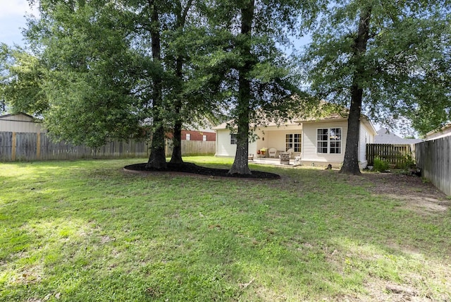 2355 Wilmington, Conway, AR 72034 - fenced backyard with a patio