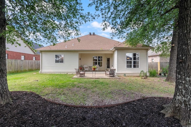 2355 Wilmington, Conway, AR 72034 - rear view of house with a patio area and a fenced backyard