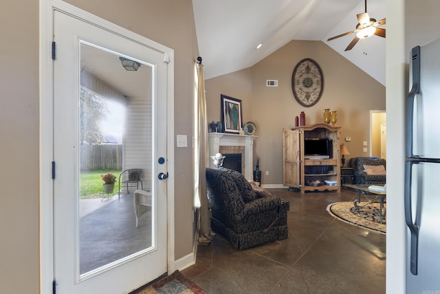 2355 Wilmington, Conway, AR 72034 - living area with ceiling fan, concrete flooring, a fireplace, and high vaulted ceiling