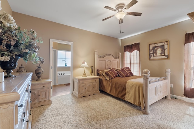 2355 Wilmington, Conway, AR 72034 - bedroom featuring light carpet, ensuite bath, and a ceiling fan