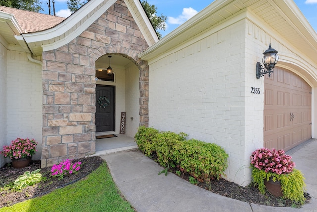 2355 Wilmington, Conway, AR 72034 - view of exterior entry with a garage