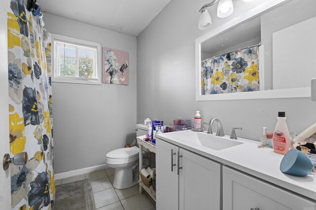 309 N Seaman St, Mccrory, AR 72101 - bathroom with vanity, tile patterned floors, and a shower with shower curtain