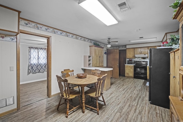 309 N Seaman St, Mccrory, AR 72101 - dining space featuring light wood-style flooring and ceiling fan
