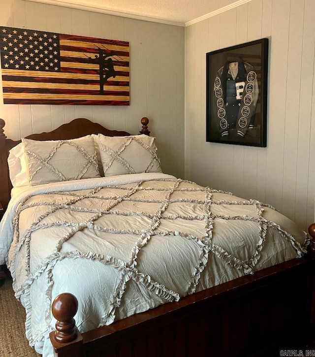 4 Paul St, Mcgehee, AR 71654 - bedroom featuring ornamental molding and wooden walls