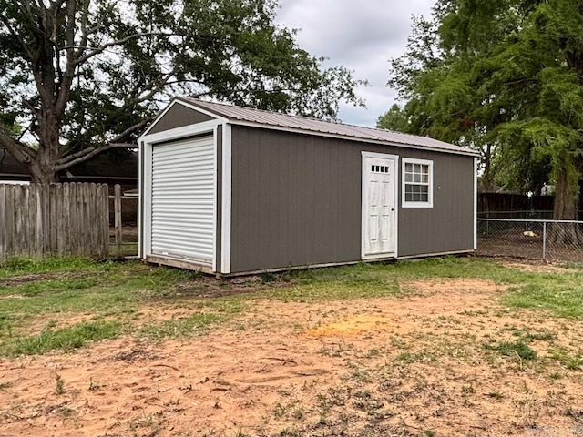 4 Paul St, Mcgehee, AR 71654 - view of outdoor structure with a fenced backyard