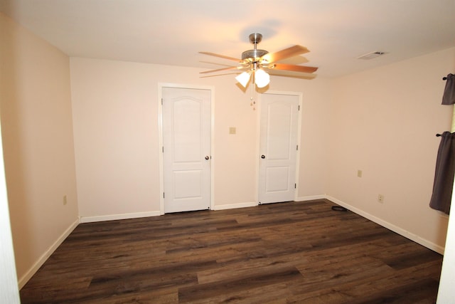 206 E Gum St, Sheridan, AR 72150 - unfurnished room featuring a ceiling fan and dark wood-style floors