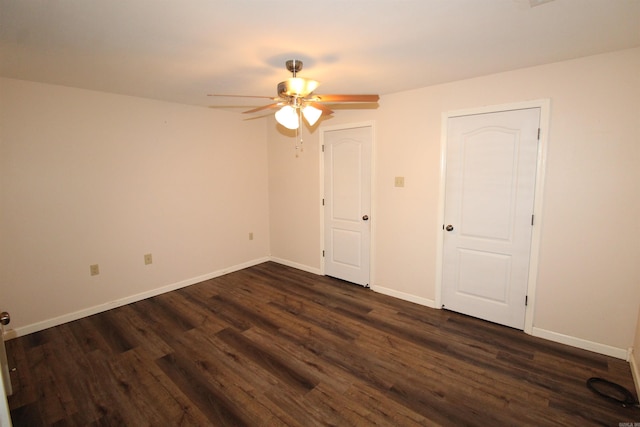 206 E Gum St, Sheridan, AR 72150 - unfurnished bedroom with dark wood-type flooring and ceiling fan