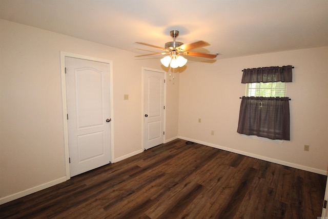 206 E Gum St, Sheridan, AR 72150 - spare room with dark wood-style flooring and a ceiling fan