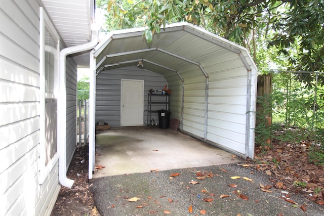 206 E Gum St, Sheridan, AR 72150 - view of parking / parking lot with a carport