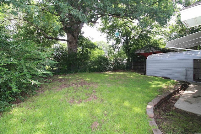 206 E Gum St, Sheridan, AR 72150 - view of yard with an outbuilding