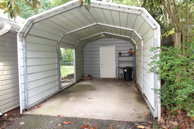 206 E Gum St, Sheridan, AR 72150 - view of vehicle parking with a carport