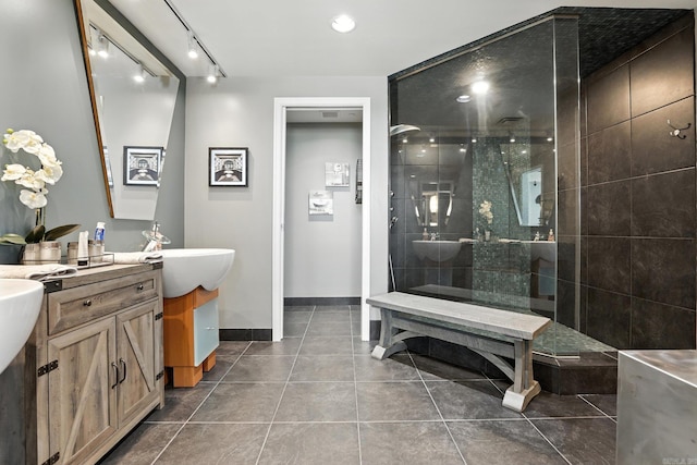 521 President Clinton Ave Unit 1101, Little Rock, AR 72201 - full bath featuring vanity, walk in shower, tile patterned flooring, and rail lighting