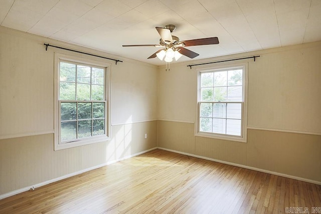 2615 Crouchwood, Little Rock, AR 72207 - empty room with hardwood / wood-style flooring, wainscoting, and a ceiling fan