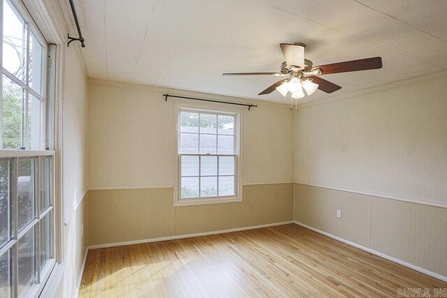 2615 Crouchwood, Little Rock, AR 72207 - unfurnished room with wood finished floors, a ceiling fan, and crown molding
