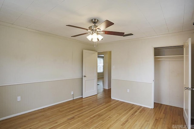 2615 Crouchwood, Little Rock, AR 72207 - unfurnished bedroom with light wood-style flooring, a closet, and a ceiling fan