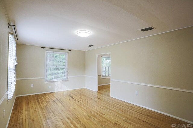 2615 Crouchwood, Little Rock, AR 72207 - unfurnished room with hardwood / wood-style flooring and plenty of natural light
