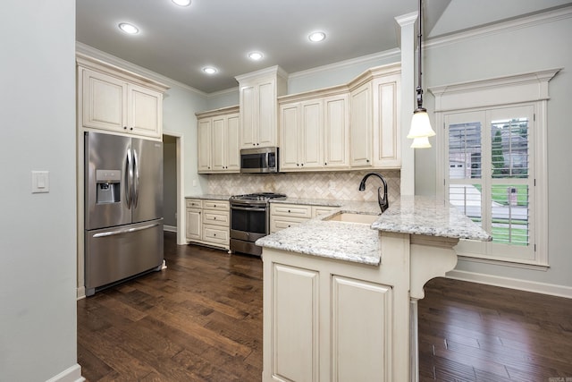2300 Gordon Rd, Little Rock, AR 72223 - kitchen with stainless steel appliances, cream cabinetry, a peninsula, ornamental molding, and decorative backsplash