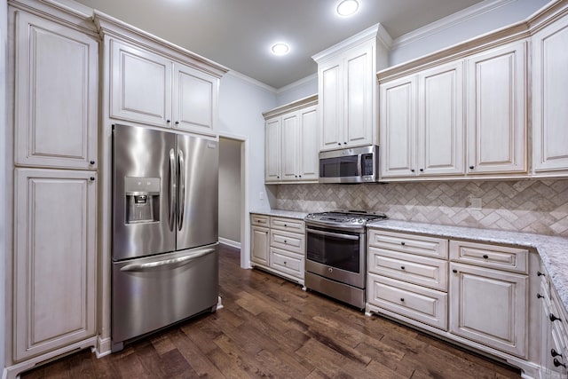 2300 Gordon Rd, Little Rock, AR 72223 - kitchen featuring stainless steel appliances, crown molding, tasteful backsplash, light stone counters, and dark wood finished floors