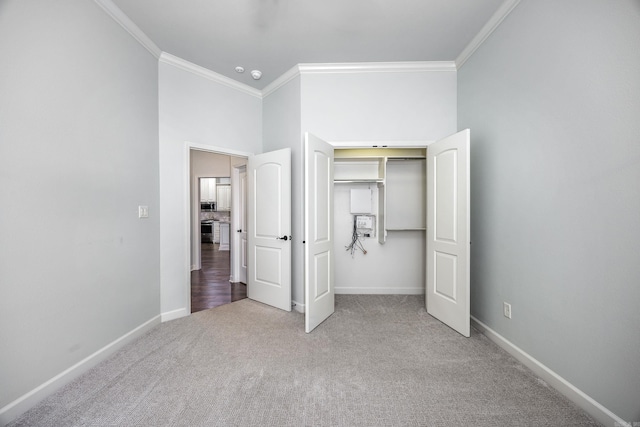 2300 Gordon Rd, Little Rock, AR 72223 - unfurnished bedroom featuring ornamental molding, carpet floors, and a closet