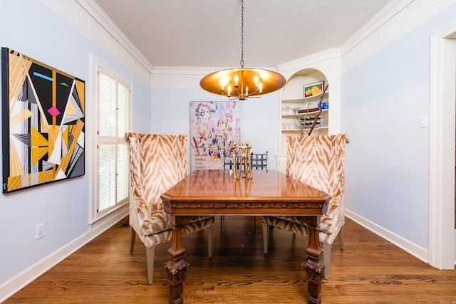 14220 Longtree Dr, Little Rock, AR 72212 - dining area with a chandelier, ornamental molding, and wood finished floors