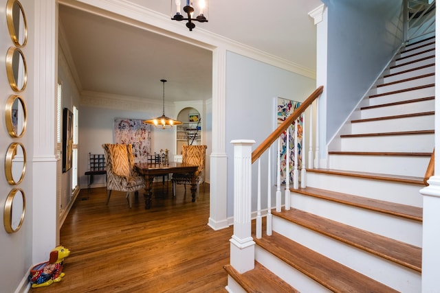 14220 Longtree Dr, Little Rock, AR 72212 - foyer with wood finished floors, stairs, and ornamental molding