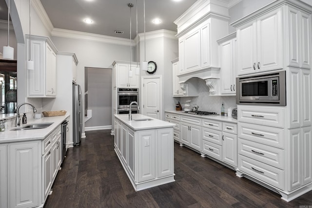 21 Ensbury Pl, Little Rock, AR 72223 - kitchen with appliances with stainless steel finishes, white cabinets, tasteful backsplash, crown molding, and recessed lighting