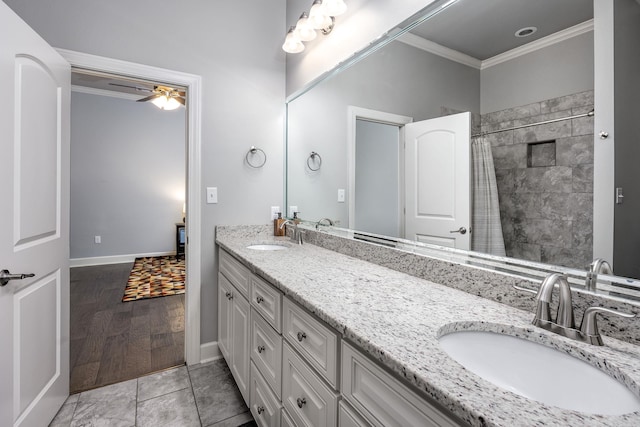21 Ensbury Pl, Little Rock, AR 72223 - full bath featuring ornamental molding, double vanity, ceiling fan, and tiled shower