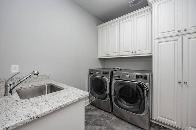 21 Ensbury Pl, Little Rock, AR 72223 - washroom featuring cabinet space and separate washer and dryer