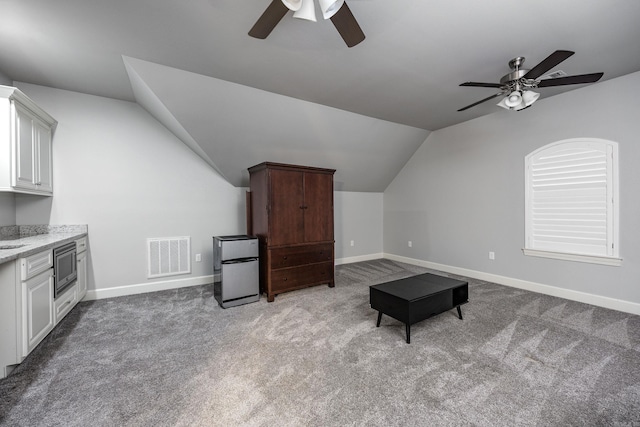 21 Ensbury Pl, Little Rock, AR 72223 - additional living space with ceiling fan, vaulted ceiling, and carpet flooring