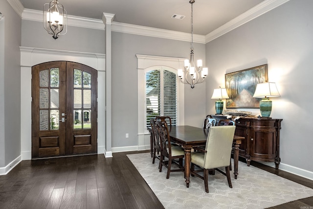 21 Ensbury Pl, Little Rock, AR 72223 - dining area with a chandelier, arched walkways, hardwood / wood-style flooring, french doors, and ornamental molding