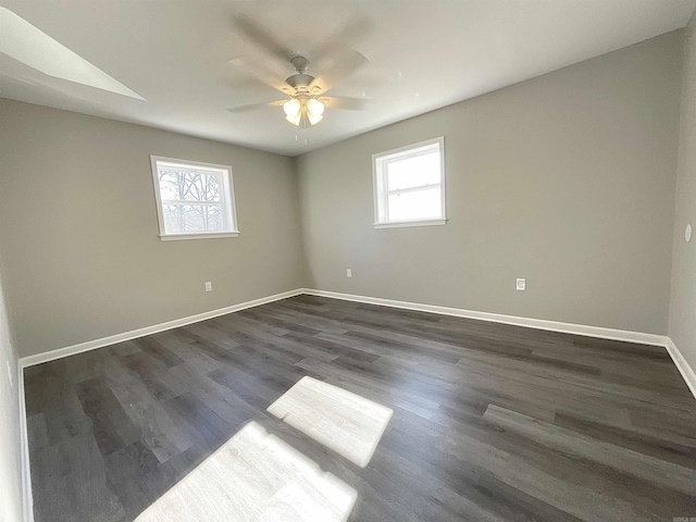 709 Melody Ln, Searcy, AR 72143 - spare room featuring a ceiling fan and dark wood-style floors