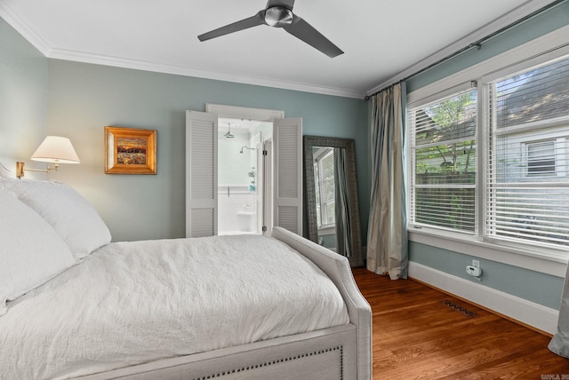 1811 N Jackson St, Little Rock, AR 72207 - bedroom featuring ornamental molding, wood finished floors, a ceiling fan, and ensuite bathroom