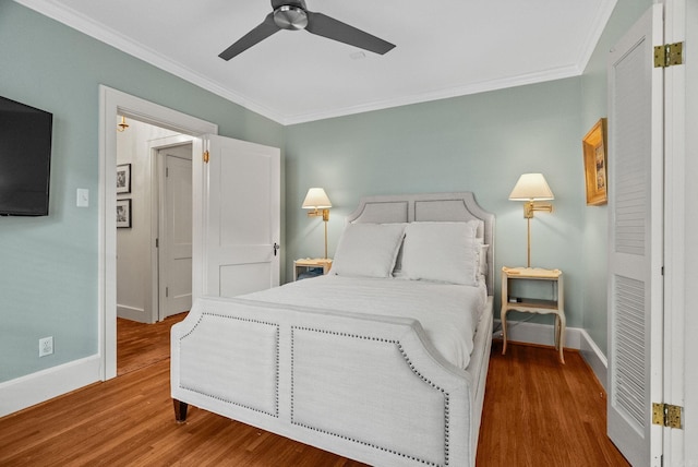 1811 N Jackson St, Little Rock, AR 72207 - bedroom featuring crown molding, wood finished floors, and ceiling fan