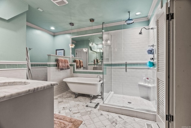 1811 N Jackson St, Little Rock, AR 72207 - full bath featuring ornamental molding, a stall shower, vanity, a soaking tub, and recessed lighting