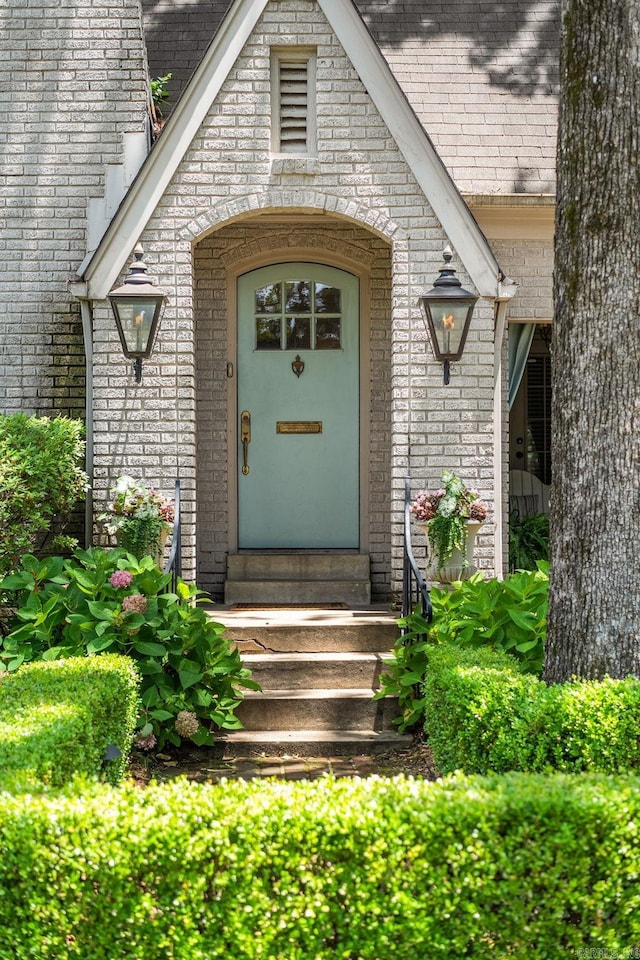 1811 N Jackson St, Little Rock, AR 72207 - entrance to property featuring brick siding and roof with shingles