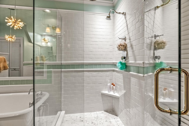1811 N Jackson St, Little Rock, AR 72207 - bathroom with tile walls, a shower stall, crown molding, and a freestanding tub