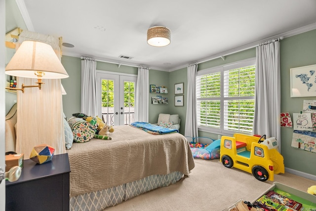 1811 N Jackson St, Little Rock, AR 72207 - bedroom featuring french doors, access to outside, ornamental molding, and carpet floors