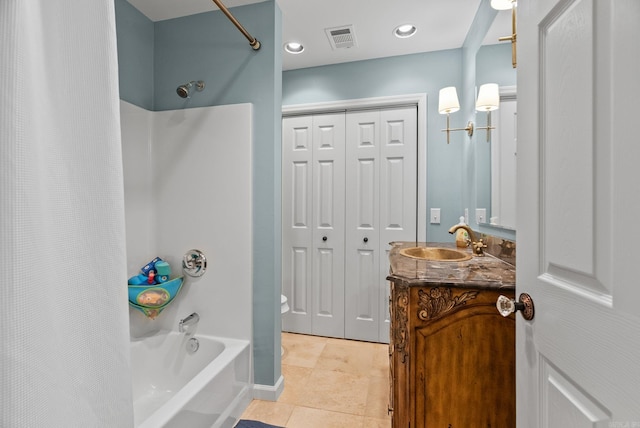 1811 N Jackson St, Little Rock, AR 72207 - bathroom featuring shower / tub combo with curtain, vanity, and a closet
