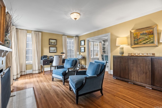 1811 N Jackson St, Little Rock, AR 72207 - living area featuring crown molding, wood finished floors, and a desk