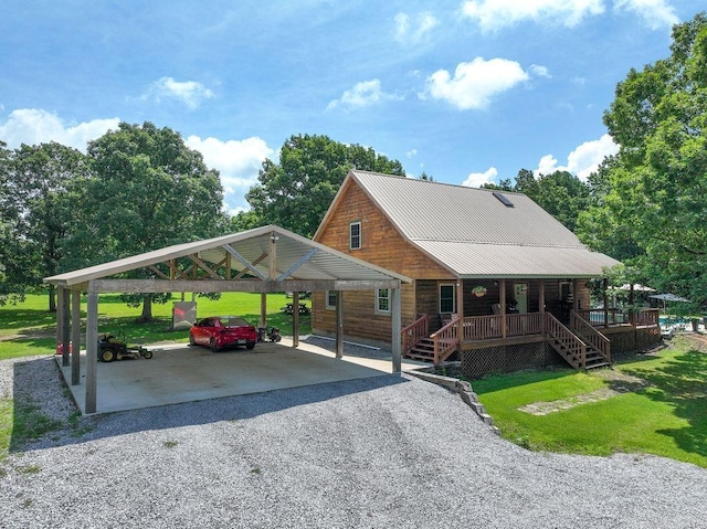 2838 Mountain View Rd, Drasco, AR 72530 - chalet / cabin with covered porch, gravel driveway, a front yard, and a metal roof