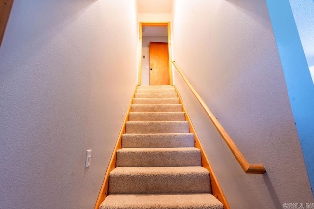 2838 Mountain View Rd, Drasco, AR 72530 - stairs featuring a textured wall