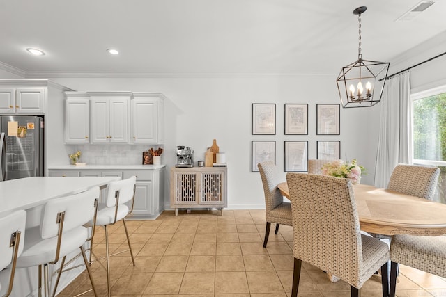 7 Chalamont Way, Little Rock, AR 72223 - dining room featuring a chandelier, ornamental molding, recessed lighting, and light tile patterned floors