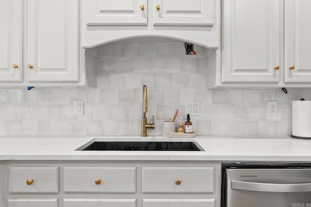 7 Chalamont Way, Little Rock, AR 72223 - kitchen featuring dishwasher, white cabinetry, light countertops, and backsplash