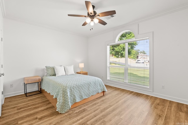 7 Chalamont Way, Little Rock, AR 72223 - bedroom with ornamental molding, wood finished floors, and ceiling fan