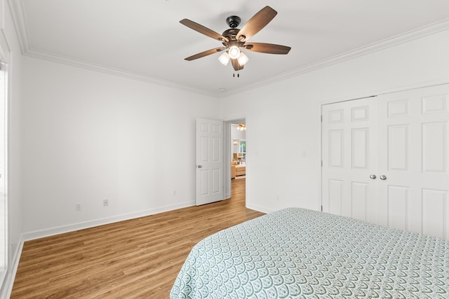 7 Chalamont Way, Little Rock, AR 72223 - bedroom featuring light wood-style floors, crown molding, a closet, and a ceiling fan