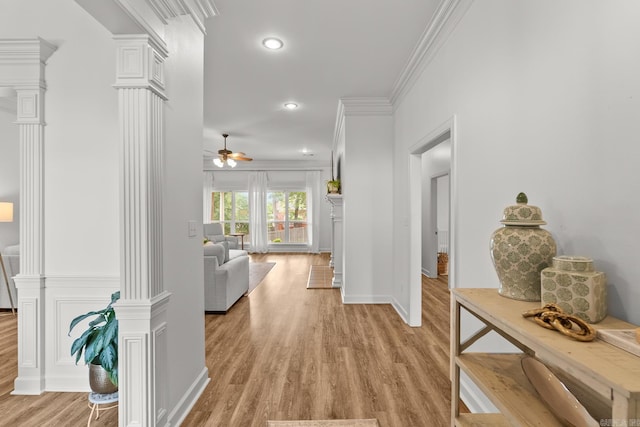 7 Chalamont Way, Little Rock, AR 72223 - hallway with decorative columns, light wood-type flooring, ornamental molding, and recessed lighting