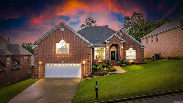 7 Chalamont Way, Little Rock, AR 72223 - traditional-style home featuring brick siding, an attached garage, a yard, and driveway