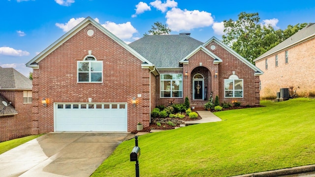 7 Chalamont Way, Little Rock, AR 72223 - traditional home with an attached garage, brick siding, a front yard, and driveway