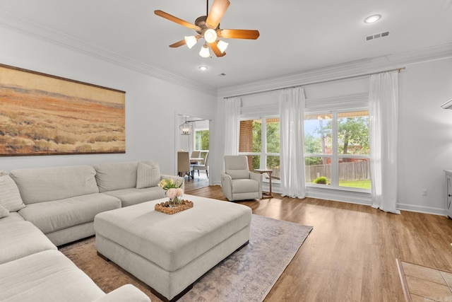 7 Chalamont Way, Little Rock, AR 72223 - living area with ornamental molding, a ceiling fan, wood finished floors, and recessed lighting