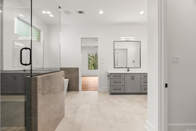 41 Haywood Ct, Little Rock, AR 72223 - bathroom with vanity, a freestanding bath, recessed lighting, and an enclosed shower